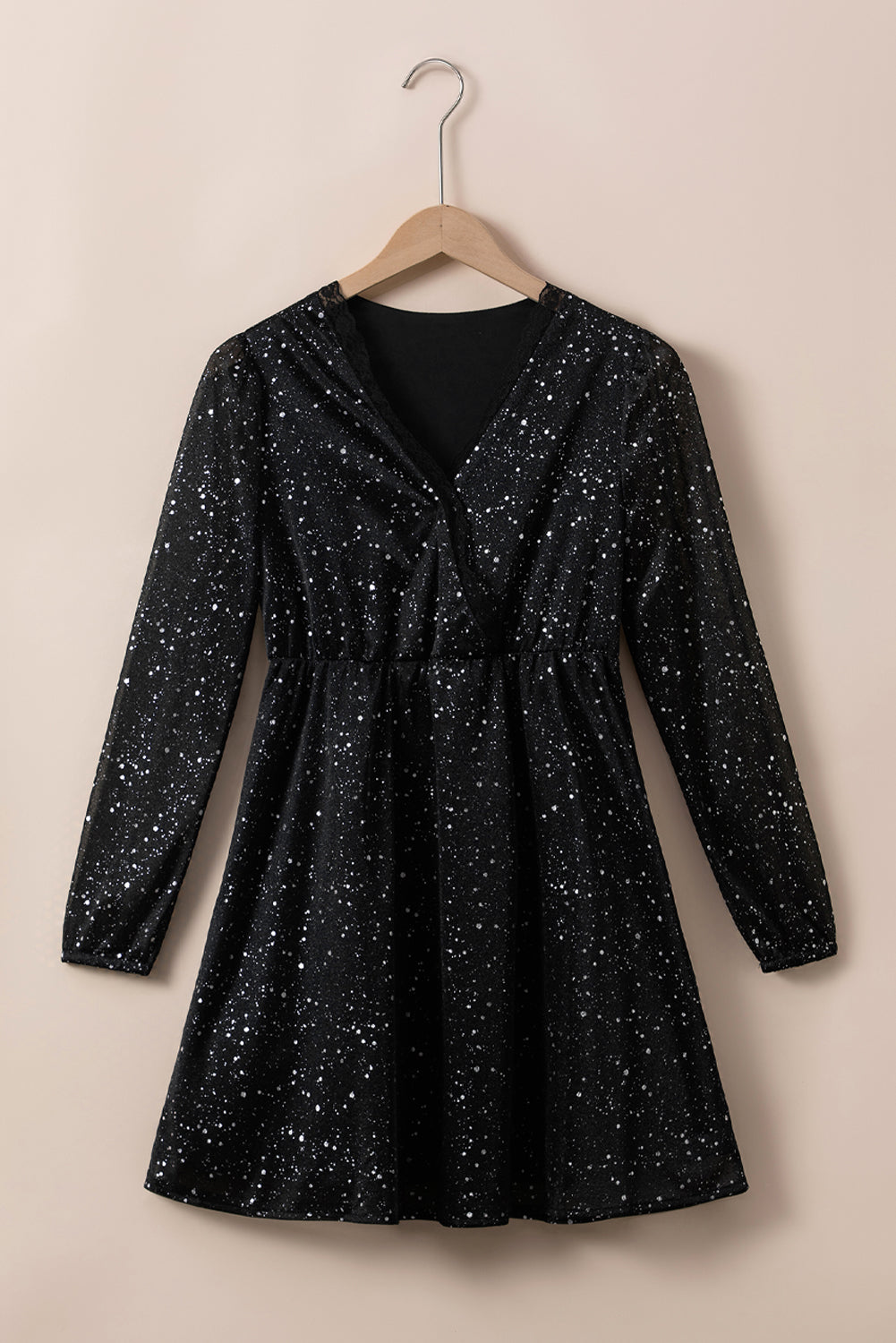 Chic Black Glitter Dress Featuring a Trendy Mesh Overlay